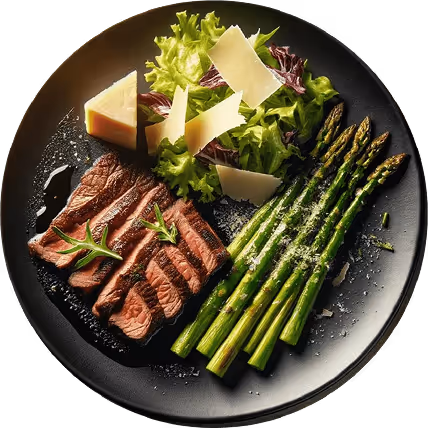 Grilled steak slices with fresh green salad, shaved cheese, and seasoned asparagus on a black plate.